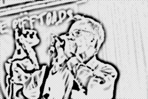 Ross Jacques playing harmonica